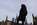 Parliament Square scene on Victory in Europe Day featuring the Sir Winston Churchill Statue, Westminster, London, England