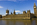 Westminster Bridge day scene featuring the honey-coloured Gothic facade of the Palace of Westminster including Elizabeth Tower and the River Thames