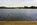 Round Pond view featuring the Jacobean mansion, Kensington Palace in the distance, Kensington Gardens, Royal London, England