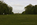 Royal Parks scene featuring a view of the Physical Energy Statue and Kensington Palace in the distance, Kensington Gardens, London, England