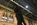 Train terminal nightography featuring the bronze Lovers Statue by Paul Day on the upper concourse of St Pancras International, London, England