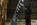 St Pancras International upper concourse nightography featuring the bronze Meeting Place Statue by Paul Day, railway terminal, London, England