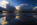 A dramatic twilight beachscape and cloudscape reflection from Red Wharf Bay featuring angry looking storm clouds, Area of Outstanding Natural Beauty, Isle of Anglesey, North Wales