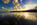 A stunning vibrant early morning sunrise beachscape and cloudscape reflection from Red Wharf Bay, Area of Outstanding Natural Beauty, Isle of Anglesey, Gwynedd