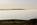 A unique coastal scene from the top of Bryn Arthur overlooking Red Wharf Bay consumed by a layer of thick fog, Isle of Anglesey, Gwynedd