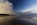 A beautiful low-light beachscape, seascape and cloudscape reflection from Red Wharf Bay featuring coastline, Area of Outstanding Natural Beauty, Isle of Anglesey, Gwynedd