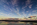 A beautiful low-light scene from Red Wharf Bay featuring a spectacular beachscape, seascape, cloudscape and coastline reflection scene, Area of Outstanding Natural beauty, Anglesey, Gwynedd