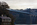 Belgian Promenade scene featuring a view of the Menai Suspension Bridge spannning the dangerous tidal water of the Menai Strait below, Isle of Anglesey, Gwynedd