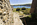 Porth Wen Brickworks vantage point scene overlooking the remains of the site featuring beehive brick kilns and the bay of Porthwen behind, Scheduled Monument, Anglesey, Gwynedd
