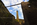 Ground level view from the Porth Wen Brickworks site featuring exposed walls, girders and a chimney, Scheduled Monument, Anglesey, North Wales