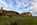 Porth Wen Brickworks scene featuring a view of the remains of the beehive brick kilns, chimney and quay, Scheduled Monument, Isle of Anglesey, North Wales 