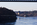 Winter-time view of a section of the suspended steel of the Menai Suspension Bridge spanning above the Menai Strait with Britannia bridge in the distance, Anglesey, Gwynedd