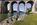 World Heritage Site scene featuring a view of the imposing stone arches of the Menai Suspension Bridge, Isle of Anglesey, Gwynedd