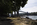 Menai Strait summer scene featuring a view of the historic Menai Suspesnion Bridge towering above the dangerous tidal water, World Heritage Site, Isle of Anglesey, Gwynedd