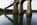 Unique reflection scene from the banks of the Menai strait featuring the historic Menai Suspension Bridge, Grade I Listed building, Isle of Anglesey, Gwynedd
