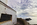 Llanddwyn Island coastal scene from Twr Mawr Lighthouse featuring a view of the Snowdonia Mountain Range, Newborough, Isle of Anglesey, Gwynedd