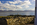 Twr Mawr Lighthouse view featuring Twr Bach Lighthouse, Llanddwyn Bay and the Snowdonia Mountain Range as a backdrop, Llanddwyn Island, Isle of Anglesey, Gwynedd