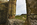 Llanddwyn Island scene from the Llanddwyn Chapel ruins feauring a view of the Celtic Cross, Newborough sand dunes and Snowdonia, Isle of Anglesey, Gwynedd