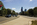 Benjamin Franklin Parkway view featuring the ceremonial tree-lined boulevard including City Hall and the Center City skyscrapers of Philadelphia in the distance