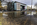 Unique scene from the sidewalk along Pennsylvania Avenue featuring the reflection of the modern architecture of the Newseum museum, Penn Quarter, Washington DC