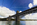 View of the Grade II Listed Britannia Bridge, a two-tier truss arch bridge spanning the tidal water of the Menai Strait, Gwynedd