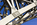 close-up of the strong lines of steel making up one of the arches of the Grade II Listed Britannia Bridge, Anglesey, Gwynedd, North Wales