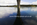 Unique scene featuring the Britannia Bridge's steel arch reflecting off the surface of the Menai Strait, North Wales